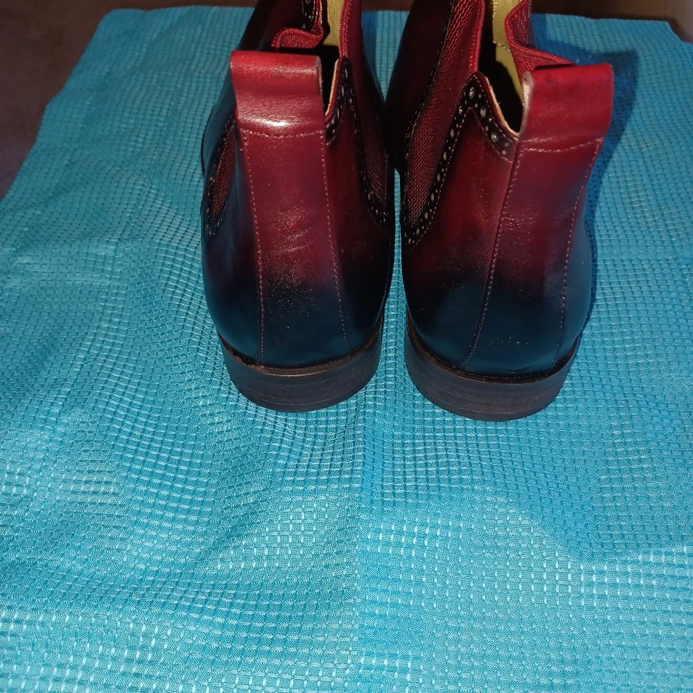 Red and Black Leather Boots with Sleek Design